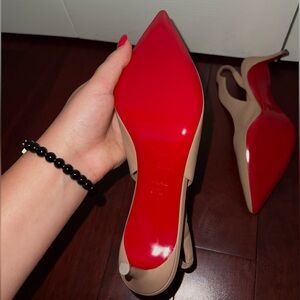 Christian Louboutin’s Red Bottoms Heels